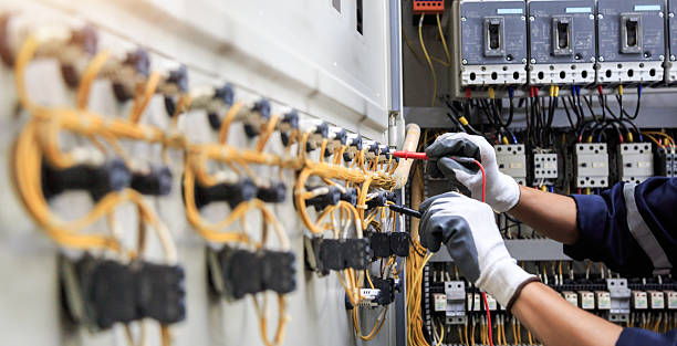 Professional Electrician technician working in Meadow Glade, WA